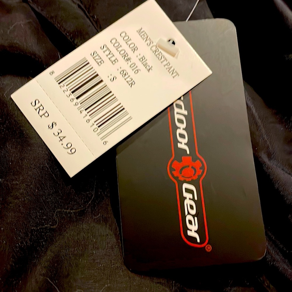 Ski pants, new with tags, men’s small, black.